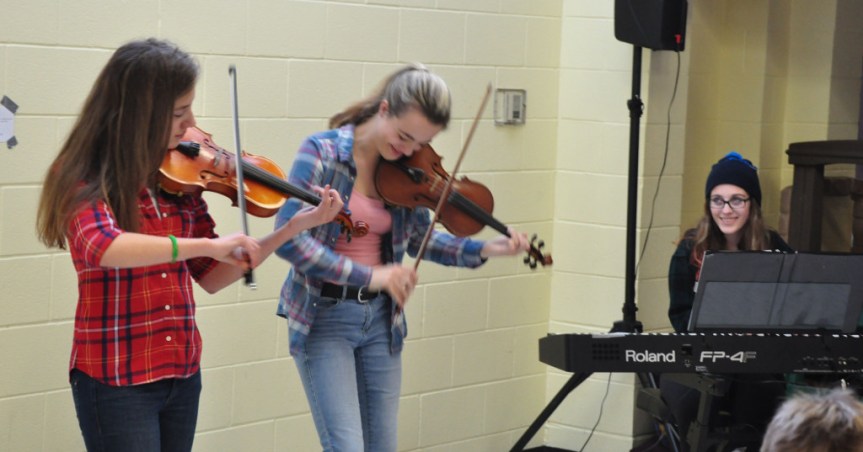 Triple Trouble provided foot-stomping entertainment at Winter Carnival 2015.
