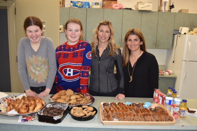 [AWESOME ORGANIZERS SARAH KOTYCK AND NATALIE RAFFOUL WITH VOLUNTEERS OLIVIA AND KATIE BOLGER]