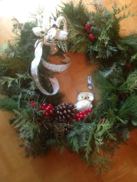 [Wreath with owl, berries, pine-cone]