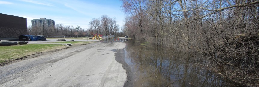 [Pontiac Street Flooded at Low Spot near St. Georges School]