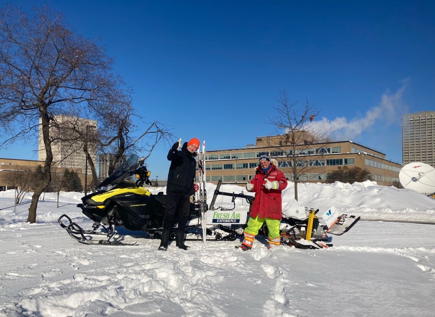 [MPP Joel Harden and Groomer Dave Adams, Tunney's Pasture in background]