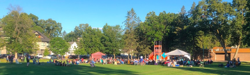 [Audience in our park watching A Company of Fools put on The Tempest, summer 2022]