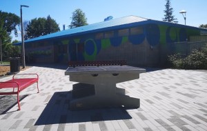 [Optomiste Park Vanie Ping Pong Table, via Google Maps]